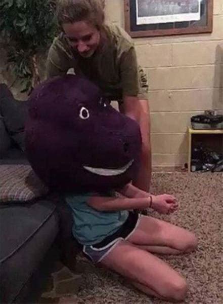 Girl Gets Stuck In The Head Of Barney The Purple Dinosaur 7 Pics