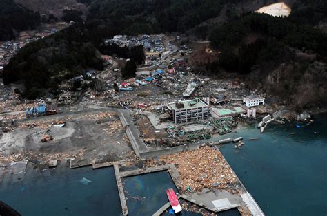 The combined earthquake and resulting giant tsunami caused huge damage in eastern japan. File:US Navy 110315-N-5503T-307 An aerial view of damage to Otsuchi, Japan, after a 9.0 ...
