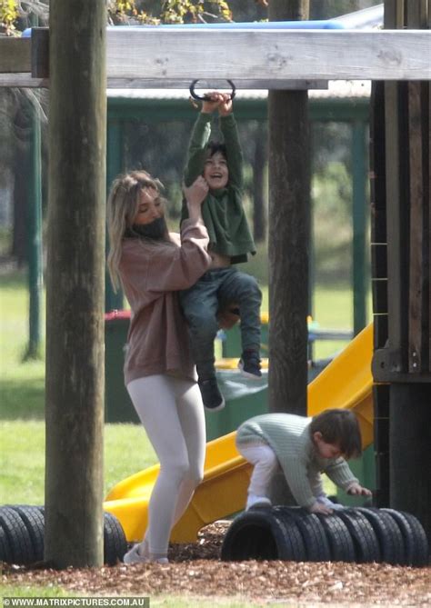 Former WAG Nadia Bartel Looks Downcast During An Outing In The Park