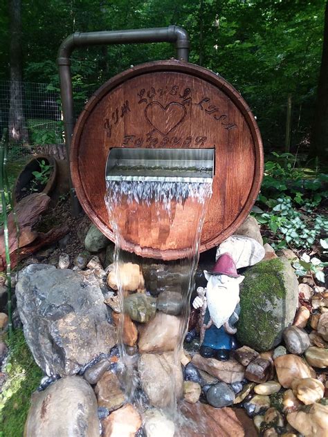 Whiskey barrel and Gnome | Whiskey barrel fountain, Diy fountain, Wine