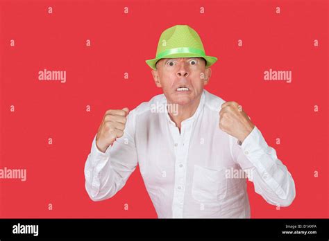 Portrait An Angry Senior Man Clenching Fists Stock Photo Alamy