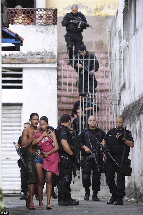 Drug Traffickers Shoot Down A Police Helicopter During Day Of Violence In Rio Slum Daily Mail