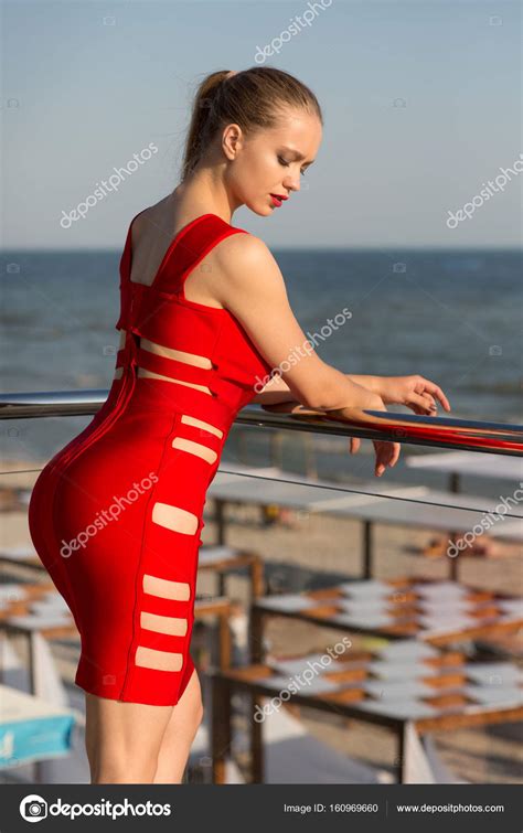 pictures good looking woman a gorgeous and good looking woman in a red dress on the