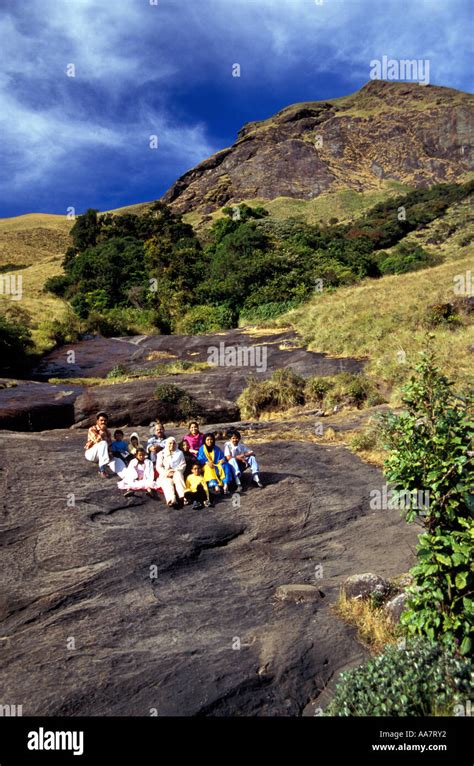 Indian Tourists Seated On Anamudi Mountain 2695m Peninsula Indias