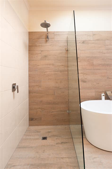 You should be able to just view the pictures and get the main idea of how to perform the tilling tasks we performed. Ceramic Timber Tiles - Bathroom Renovation in Belmont