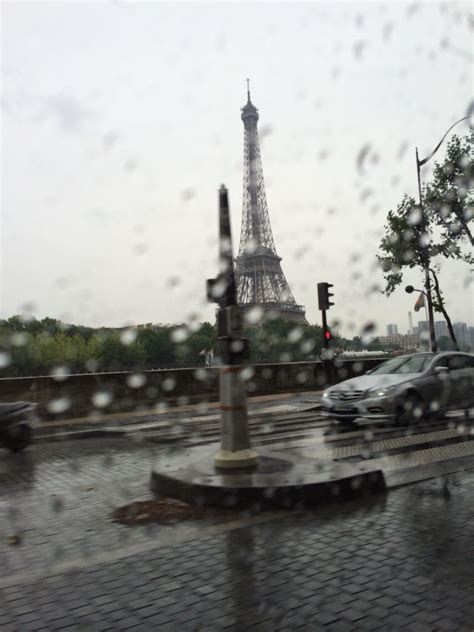 Rainy Paris With The Beautiful Eiffel Tower