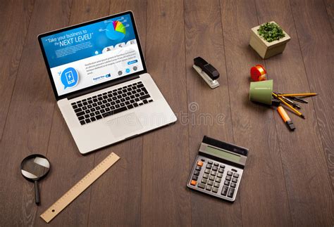 Laptop On Office Desk With Business Website On Screen Stock Image
