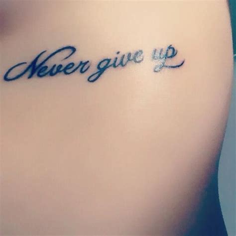 22 Superb Never Give Up Tattoo Design And Ideas