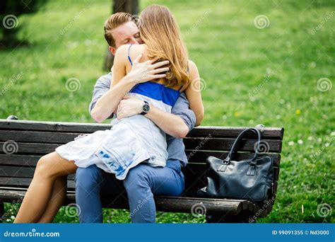 Dating Couple Sitting On Bench Stock Image Image Of Sunshine Lovers