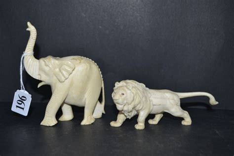 African Ivory Carved Elephant C1960 Together With Lion Evening