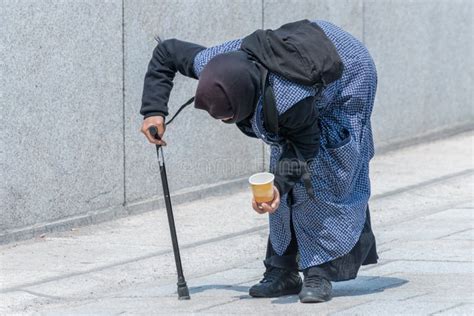 Old Beggar Woman Bent Over In A Pedestrian Zone Germany Stock Image Image Of Pedestrian