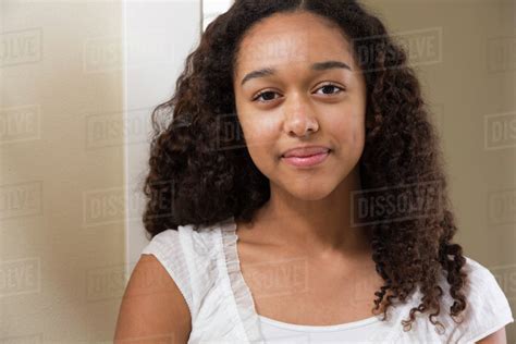 Mixed Race Teenage Girl Smiling Stock Photo Dissolve