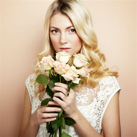 portrait of a beautiful blonde woman with flowers portrait of a beautiful blonde woman with