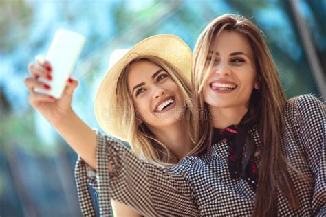 Two Female Friends Taking A Selfies Stock Image Image Of Tourism