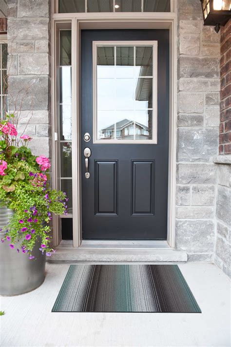 This Beautiful Blue And Black Mat Brightens The Front Entrance Front