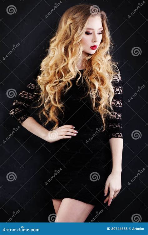 Beautiful Woman With Blonde Hair In Black Dress Stock Photo Image Of