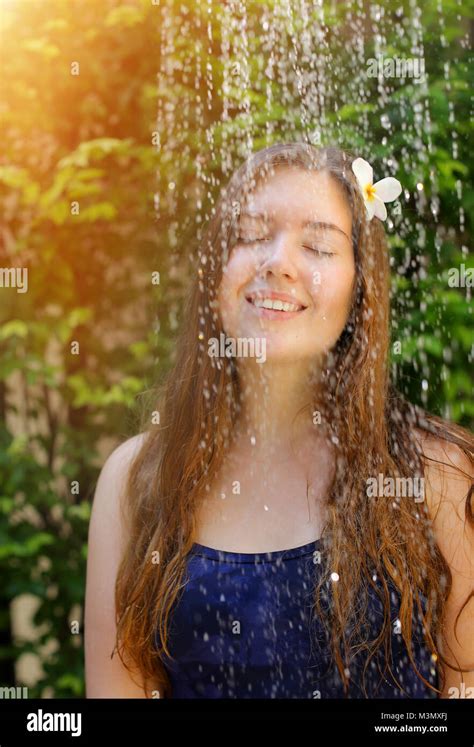 Portrait Of Beautiful Woman Enjoy Taking Shower Outside Stock Photo Alamy