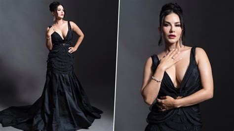 Sunny Leone Flaunts Massive Cleavage In Black Maxi Dress With Plunging Neckline View Pics Of