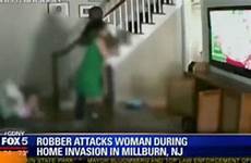 invasion woman brutal camera attacked caught violent attack during daughter being police screengrab supplied violently frightening moment source her