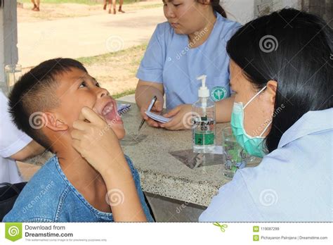 Doctor Is Checking The Oral Cavity Of A Student Editorial Stock Image