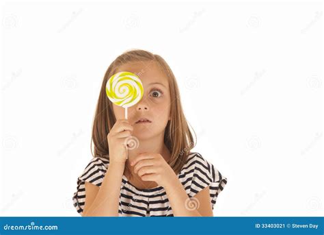 Young Girl Holdiing A Sucker Over Her Face Funny Stock Image Image