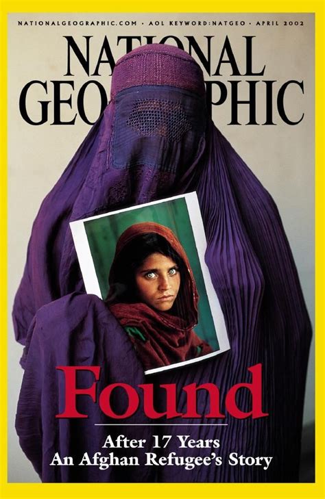 Sharbat Gula Holds Her Portrait Which Became The Most Famous Picture