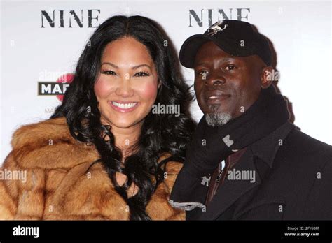 Kimora Lee Simmons And Djimon Hounsou Attend The Premiere Of Nine At