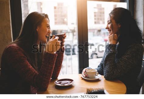 Two Girls Sitting Cafe Drinking Coffee Stock Photo 767753224 Shutterstock