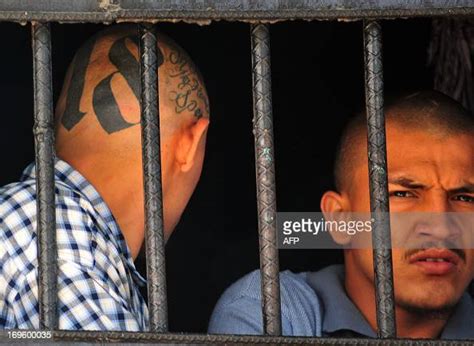 Members Of The Mara 18 Gang Are Pictured Behind Bars At The Prison