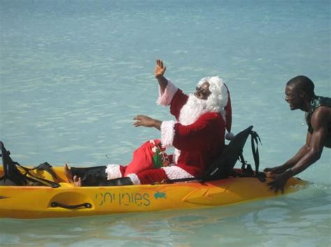 santa has arrived to jamaica via a couples kayak [picture submitted via photo contest 2011