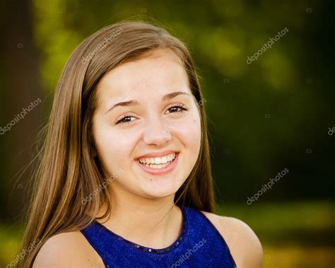 Portrait Of Happy Pre Teen Girl Stock Photo By ©robhainer 25455051