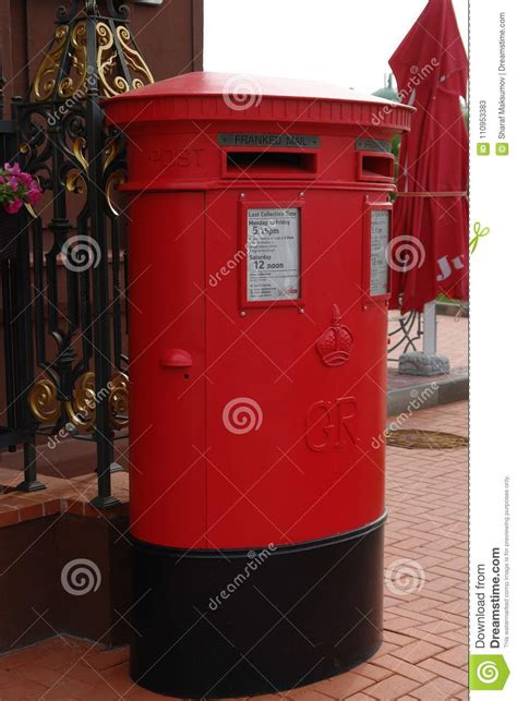 Traditional British Red Post Box On Street Editorial Stock Photo