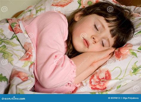 Girl Sleeping In A Field Of Grass Royalty Free Stock Image