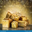 Golden Gift Boxes As a Symbol of Wishes and Celebration. Golden Blurred ...