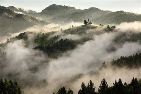 Rolling Fog At Sunrise In The Skofjelosko Hribovje Hills With St