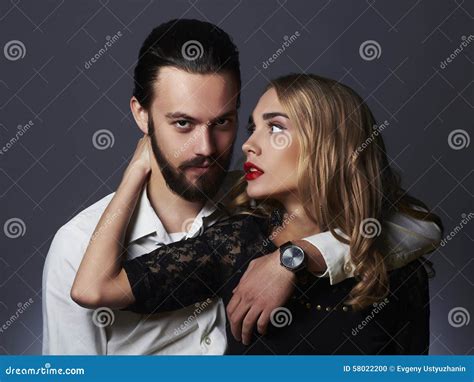 Fashionable Couple In Tender Passion Beautiful Woman Near The Man