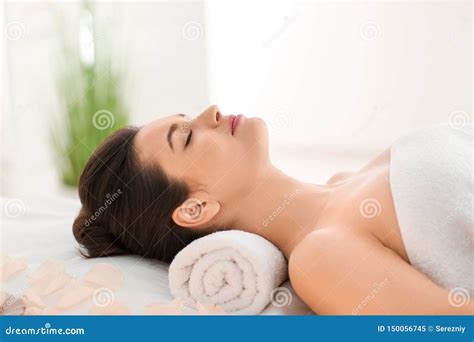 Young Woman Relaxing On Massage Table At Spa Salon Stock Image Image Of Person Adult 150056745