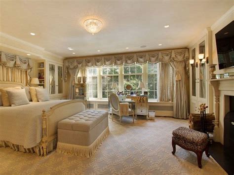 traditional master bedroom with bed ottoman and fireplace parisian interior bedroom interior