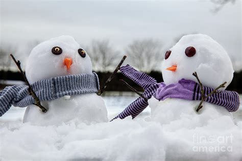 Two Cute Snowmen Wearing Scarfs And Twigs For Arms Photograph By Simon