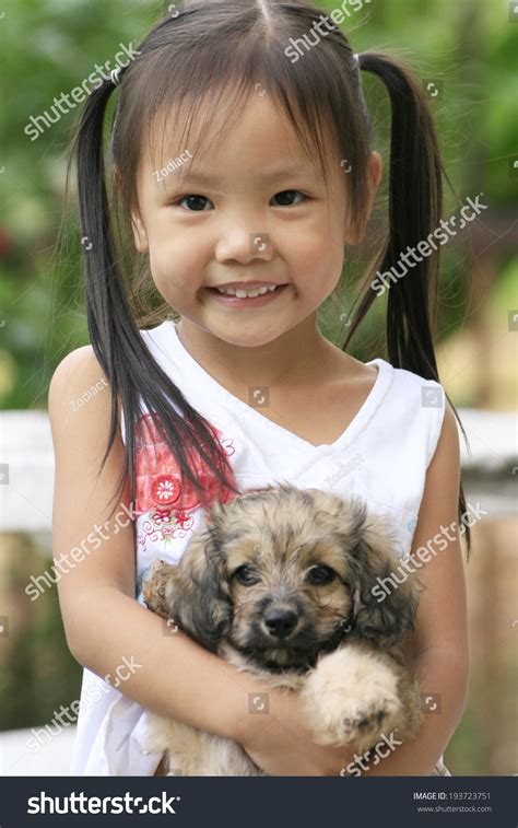 Discover more posts about puppy, video, kitty, doglover, animals, cute, and doggy. Asian Girl Little Girl Her Doggy Stock Photo 193723751 ...