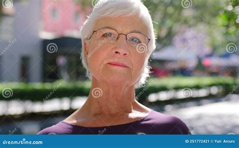 Serious Old Woman With Glasses Outside Portrait Of Grey Haired Female