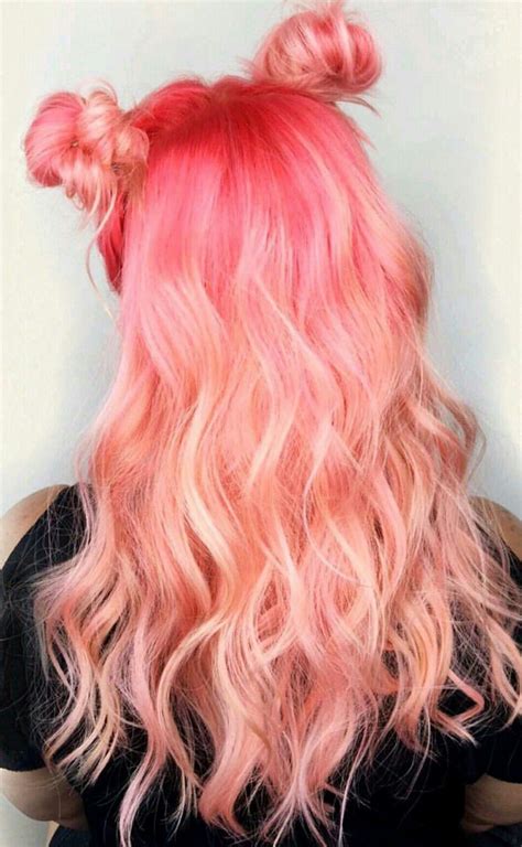 Peach Pink Hair Color Inspo With Space Buns For Medium Length Hair In