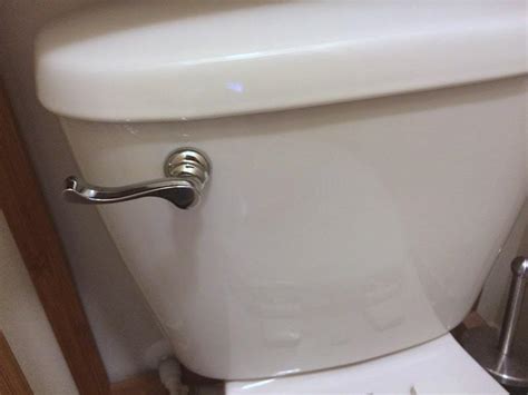Replace the lid on top of the toilet and turn the water supply back on. How to Fix a Toilet Handle - DIY Danielle®