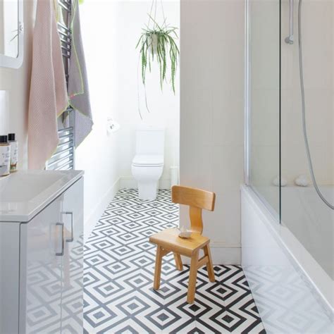 These tile pattern ideas for floors are just what you need to make a fresh statement. Modern monochrome bathroom with geometric vinyl floor ...