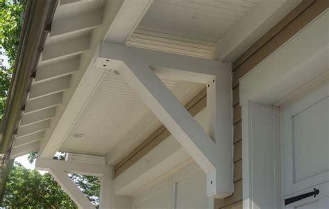 Brackets Exposed Rafter Tails And Half Round Gutters Craftsman