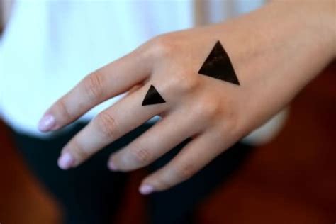 Black Ink Triangle Tattoos On Hand