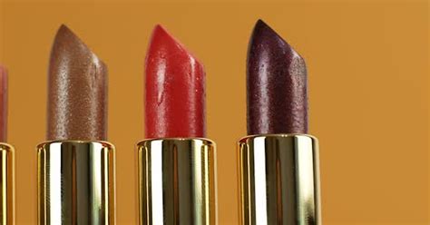 A Slider Of Movement Of Lipsticks Of Different Colors Cosmetics For
