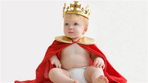 Cute Baby Boy Is Wearing Golden Crown On Head Wearing Red ...