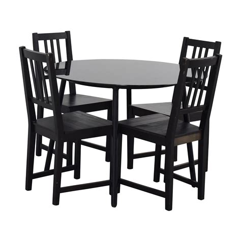 The upholstered chairs in this set feel a bit more formal, and again, the ekedalen table extends to seat. 31% OFF - IKEA IKEA Glass and Wood Table and Chairs / Tables