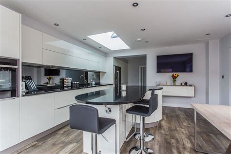 Beautiful Contemporary White High Gloss Kitchen With Top Trim Handles